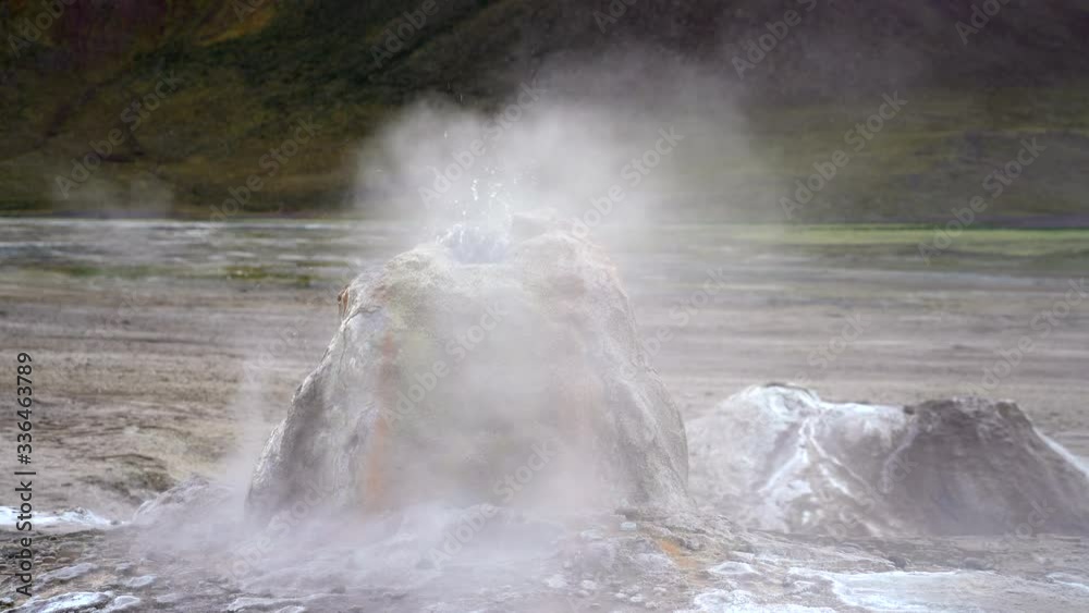 Close up shot of gurgling geyser cone at El Tatio, the third-largest geothermal field in the world, located in the Atacama desert in northern Chile near the border with Bolivia. Close up shot of gurgling geyser cone at El Tatio, the third-largest geothermal field in the world, located in the Atacama desert in northern Chile near the border with Bolivia.