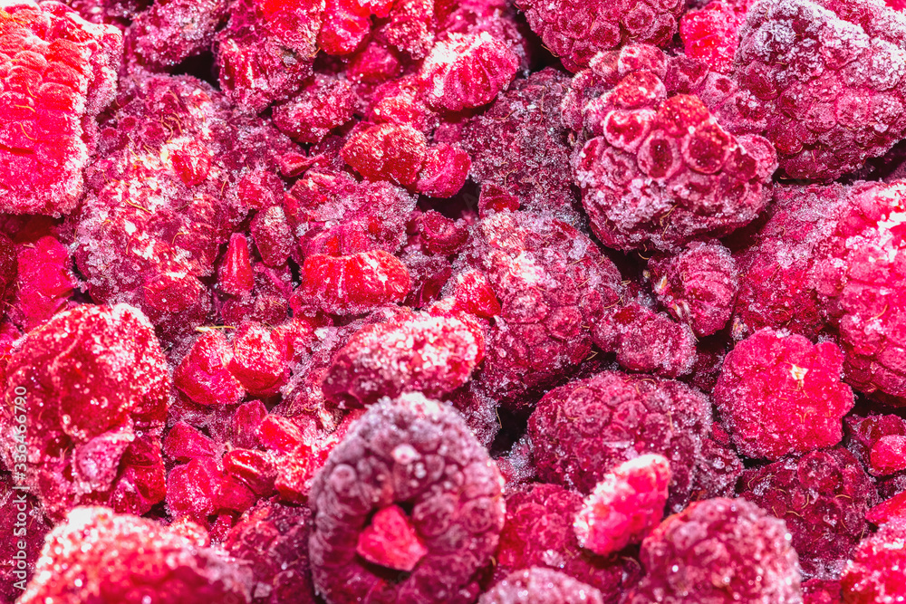 delicious frozen raspberries in extreme close-up