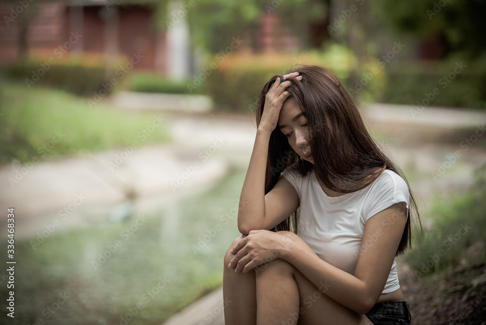 Beautiful thai woman very sad from unrequited love,She rethink and think over about love,vintage style,dark tone,broken heart,asian girl Beautiful thai woman very sad from unrequited love,She rethink and think over about love,vintage style,dark tone,broken heart,asian girl