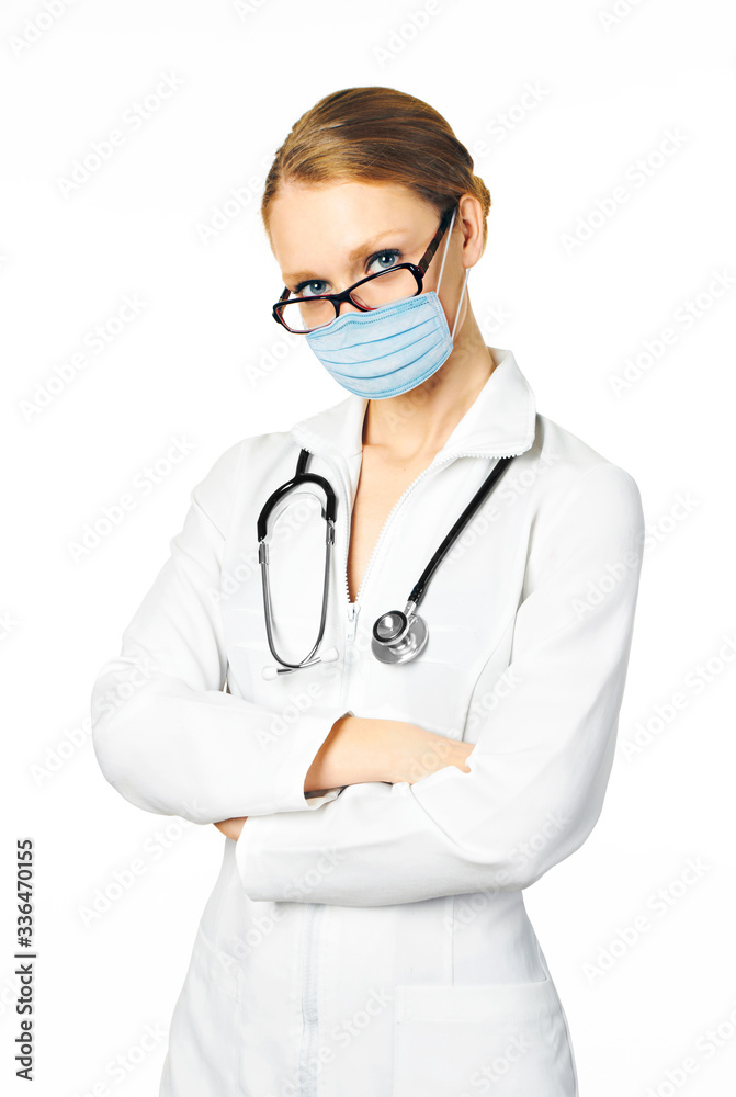 Female doctor with stethoscope in a protection mask Female doctor with stethoscope in a protection mask