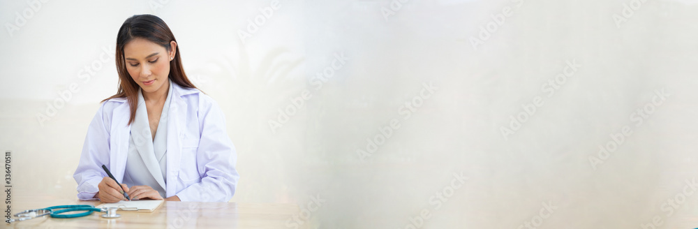 Young intern doctor women smile on wide white background concept people working check for Coronavirus in medical hospital health care, Modern Nurse in medico clinic business service. Covid-19 Young intern doctor women smile on wide white background concept people working check for Coronavirus in medical hospital health care, Modern Nurse in medico clinic business service. Covid-19