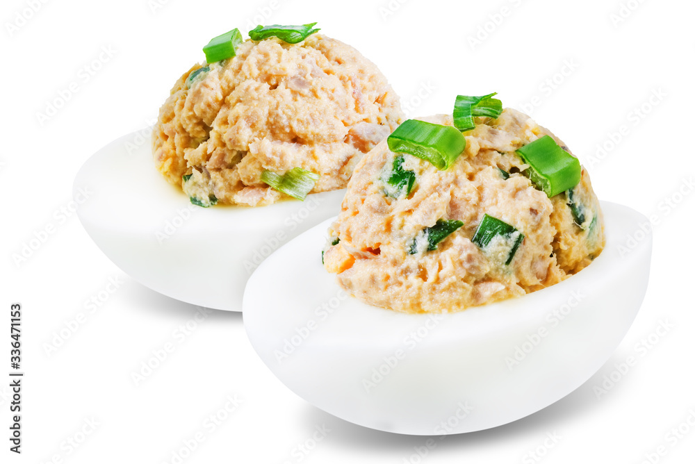 Canned Tuna deviled eggs with scallion on a white isolated background Canned Tuna deviled eggs with scallion on a white isolated background