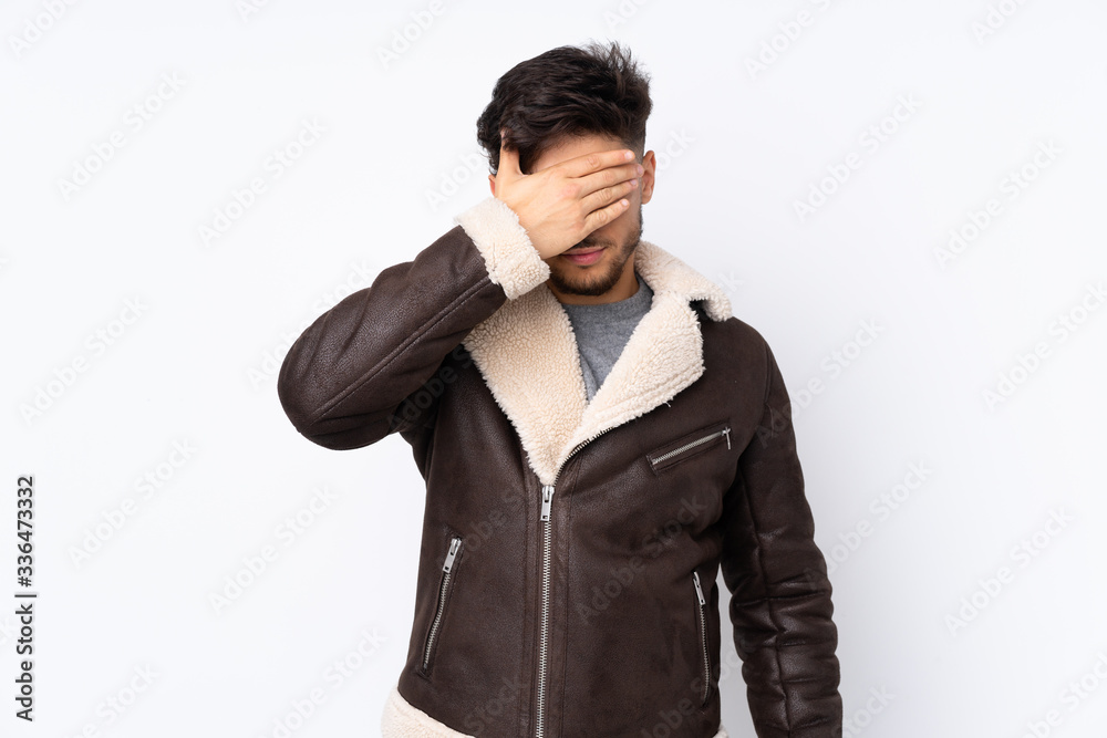 Arabian handsome man over isolated background covering eyes by hands. Do not want to see something Arabian handsome man over isolated background covering eyes by hands. Do not want to see something