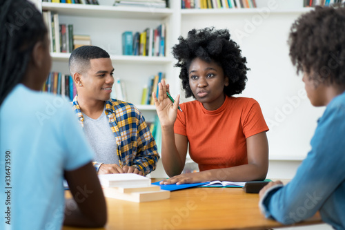 Group of talking brazilian and african american students