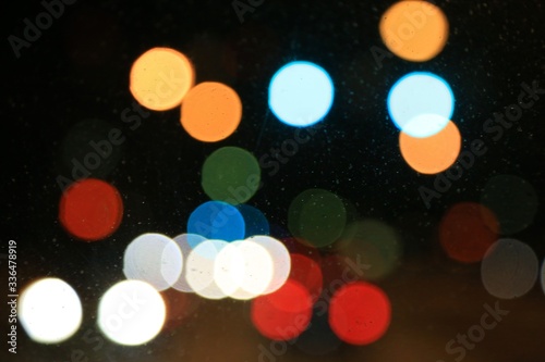 Fotografie, Obraz Illuminated orbs of color on a dark sky