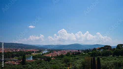 Beautiful aerial landscape of the city of Florence, Italy with various houses and church at sunset