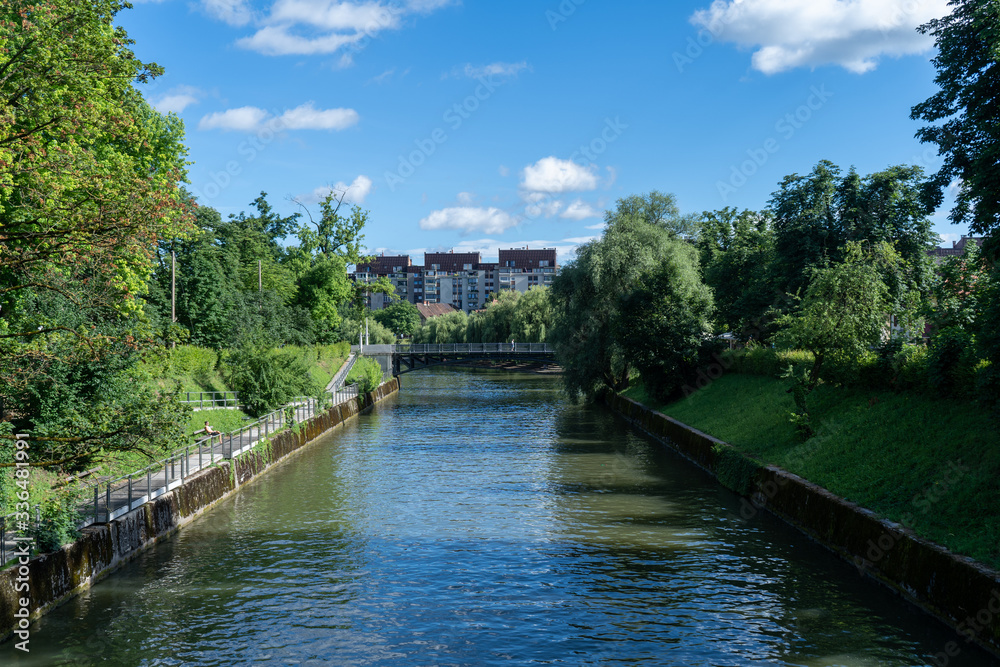 View of the Ljubljana river in between of the beautiful nature of Slovenia, June 2019