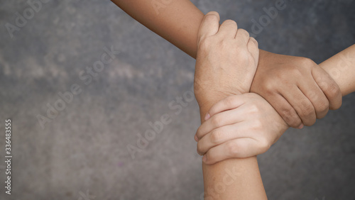 Human join hands together background, collaboration of business and education teamwork concept
