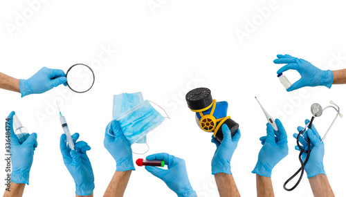 Valokuva many hands holding medical tools on white
