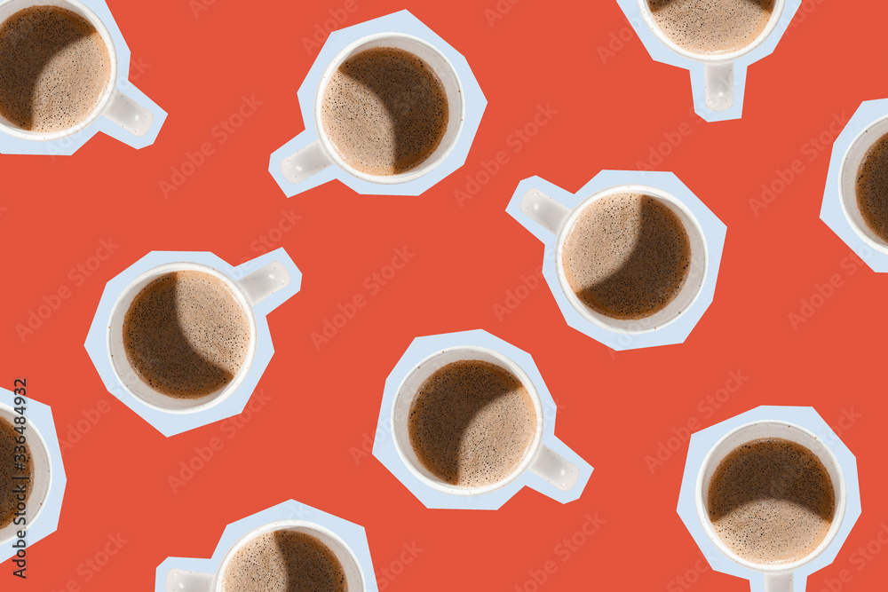 Many mugs with black coffee on a red paper cut background. Top view