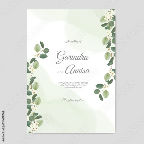 Elegant wedding invitation card template design with floral wreath  and leaves Premium Vector photo
