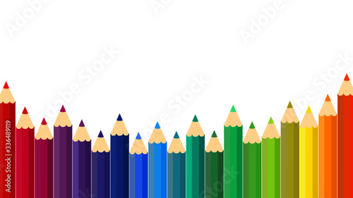 This is a vector background with colored pencils, colorful crayons.