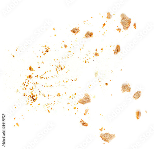 Bread crumbs isolated on white background. Top view. photo