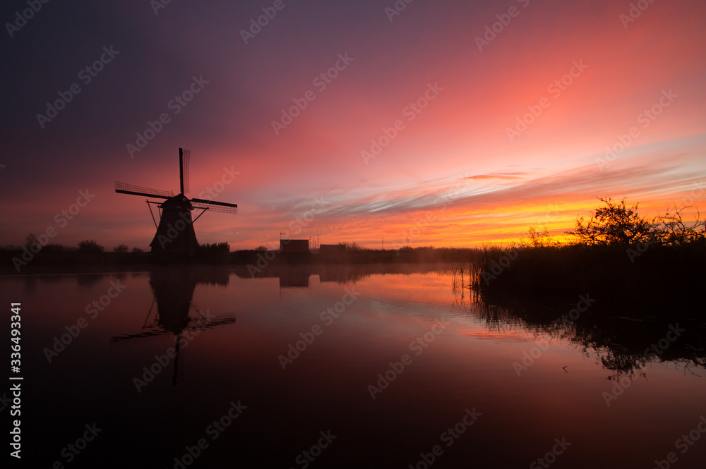 windmills at sunset