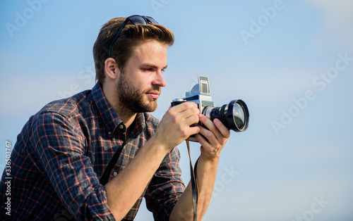 Click Of Artistic Joy. capture adventure. journalist. travel with camera. male fashion style. looking trendy. photographer in glasses. sexy man touristic reporter. macho man with camera