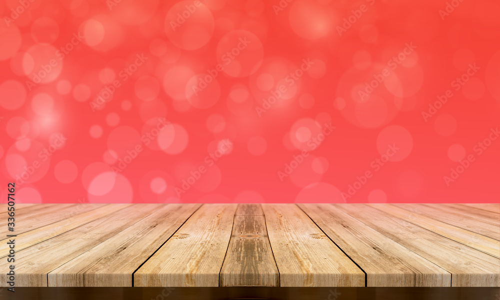 Empty wooden table with a beautiful colour bokeh background Empty wooden table with a beautiful colour bokeh background