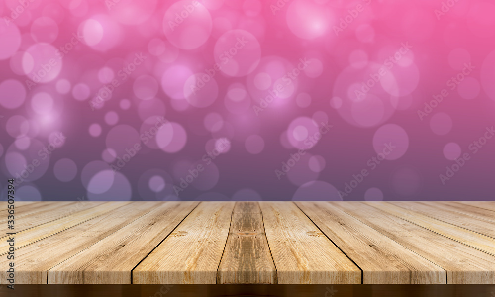 Empty wooden table with a beautiful colour bokeh background