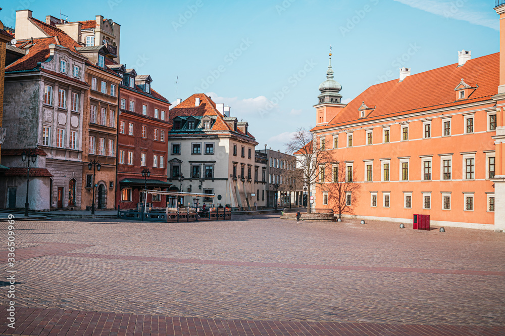 Royal Castle in Warsaw, Poland. Old colorful houses in the old town of Warsaw on a sunny.
