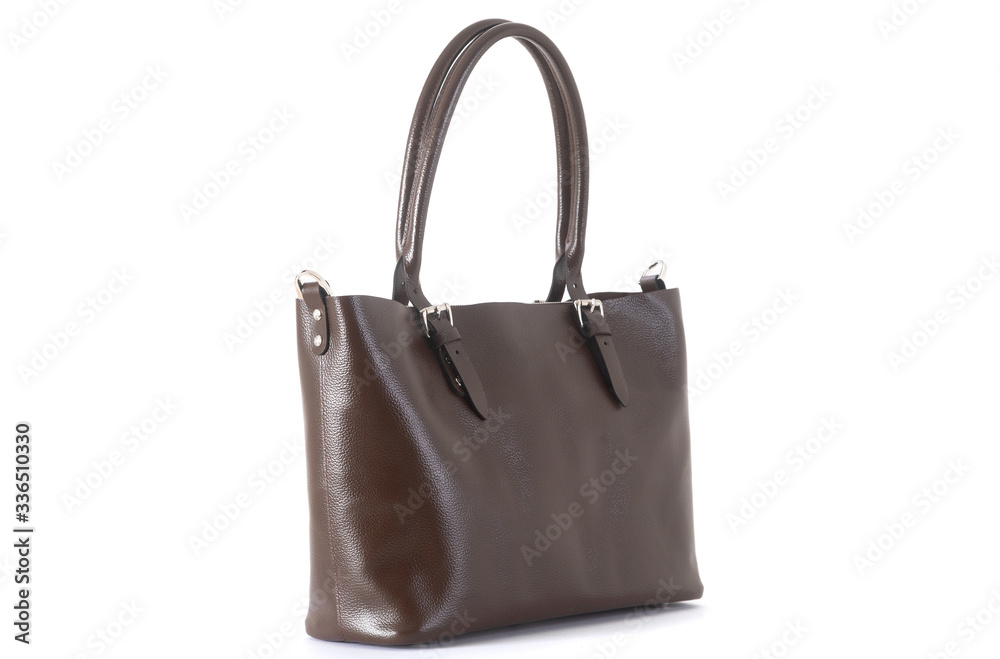 leather female brown bag on the handle sideways on a white background leather female brown bag on the handle sideways on a white background