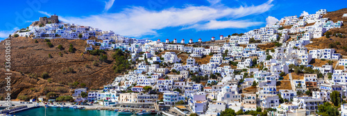 Traditional Greece - beautiful Astypalea island.  View of Chora village with white houses and windmills © Freesurf