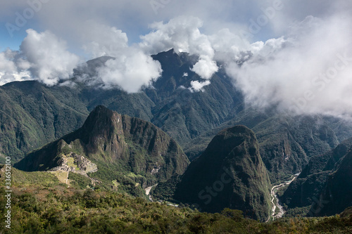 Machu Picchu surrounded by green hills Andean and urabamba river panorama from Montagna viewpoint