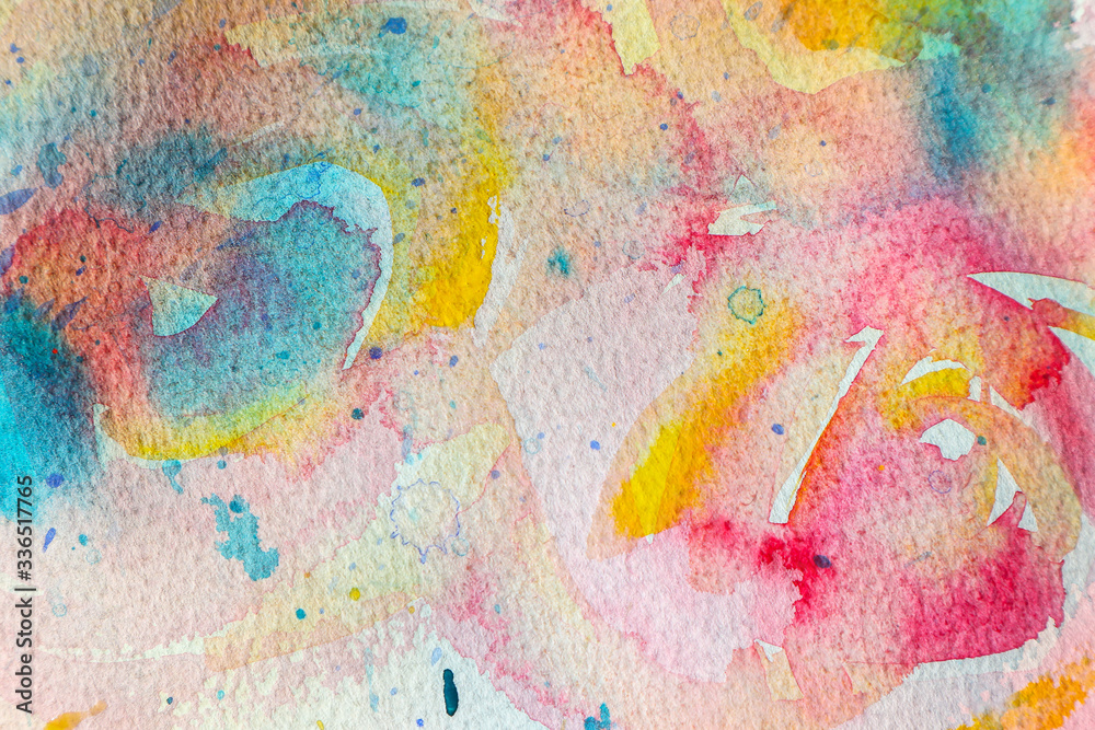 Watercolor splashes on light paper background