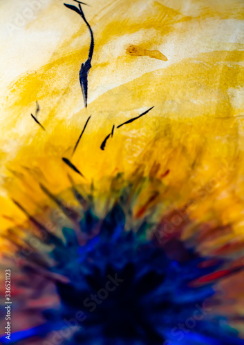 abstract conceptual drawing - black hole with blue glow on a yellow background