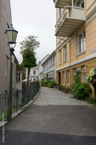 Bergen / Norway - June, 2019: View of street and authentic houses of Bergen.