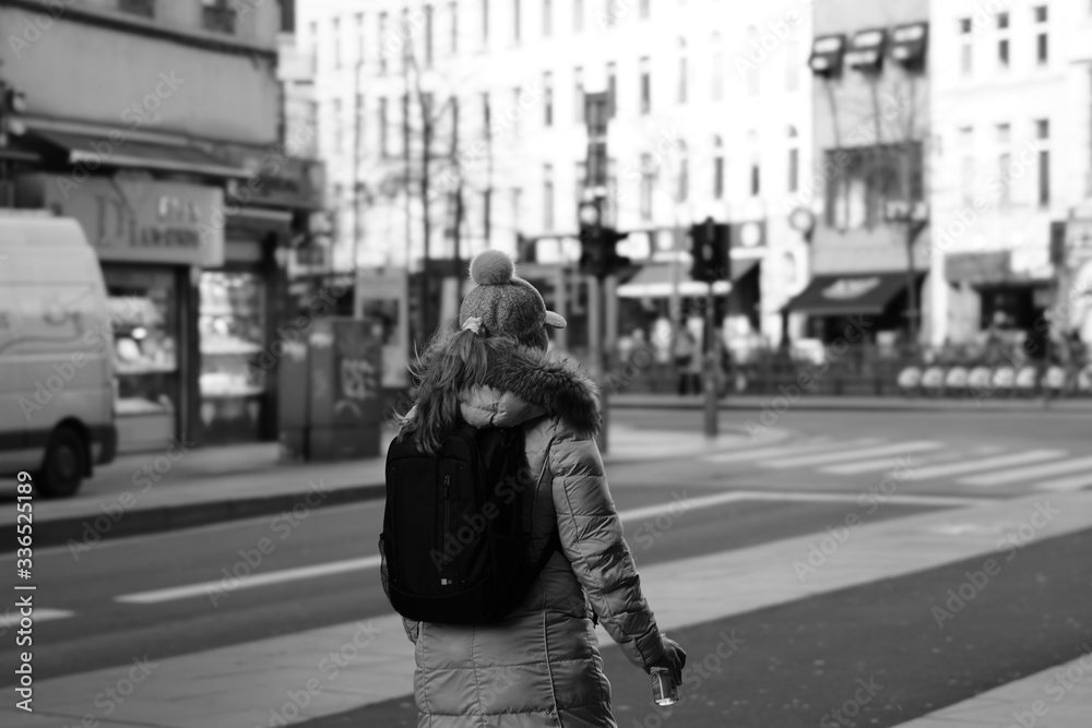 young woman walking in the city