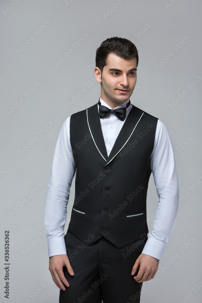 2020 Clothes, Waiter for concept design. White background isolated. Customer service. Handsome young man isolated. Service concept. 2020 Clothes, Waiter for concept design. White background isolated. Customer service. Handsome young man isolated. Service concept.
