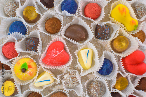 A lot of delicious multi-colored sweets. Close-up. photo