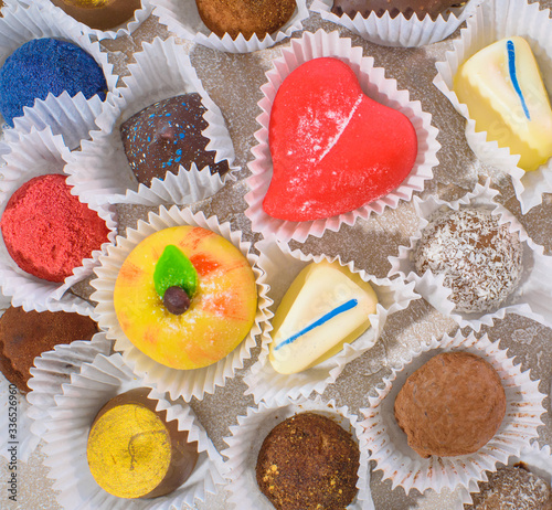 A lot of delicious multi-colored sweets. Close-up. photo