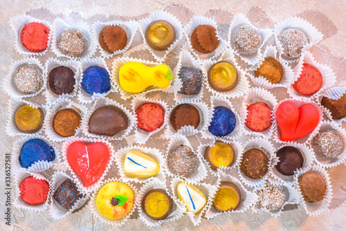 A lot of delicious multi-colored sweets. Close-up. photo