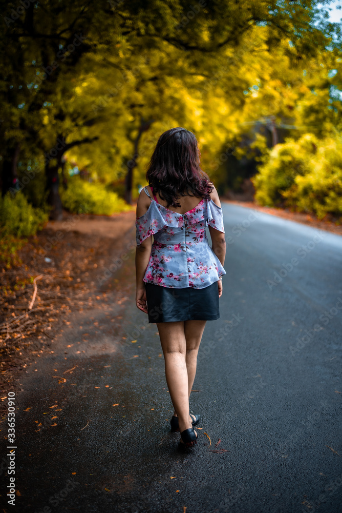 little girl walking on the road little girl walking on the road