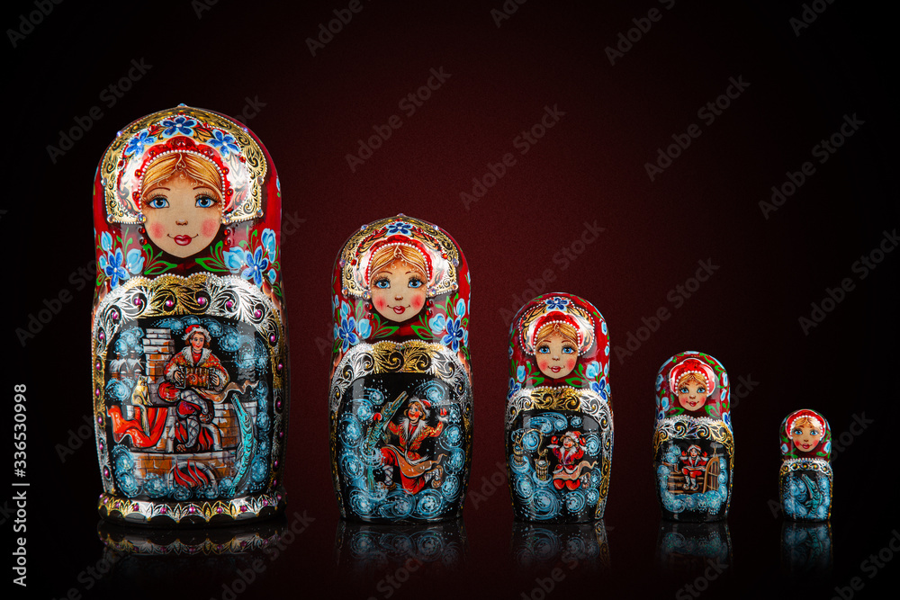 Russian traditional toy matryoshka, on a dark background