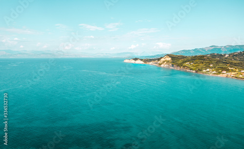 Aerial top view of summer beach and sea.Free space for your decoration and sunny warm day.Corfu island of Greece. 
