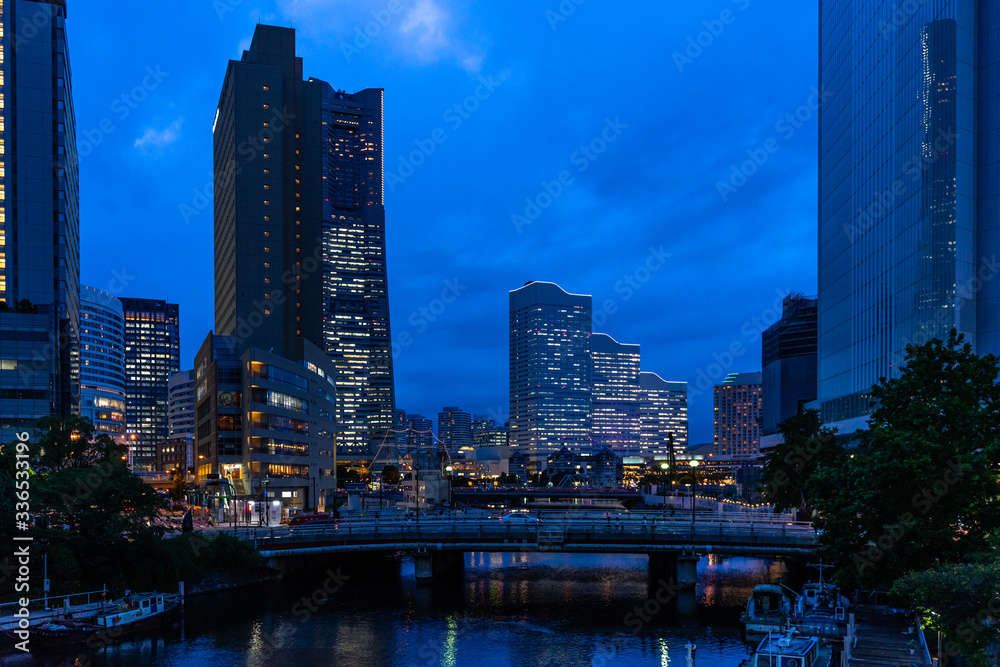 The futuristic skyline of Yokohama at dusk at Minato Mirai business district, Japan