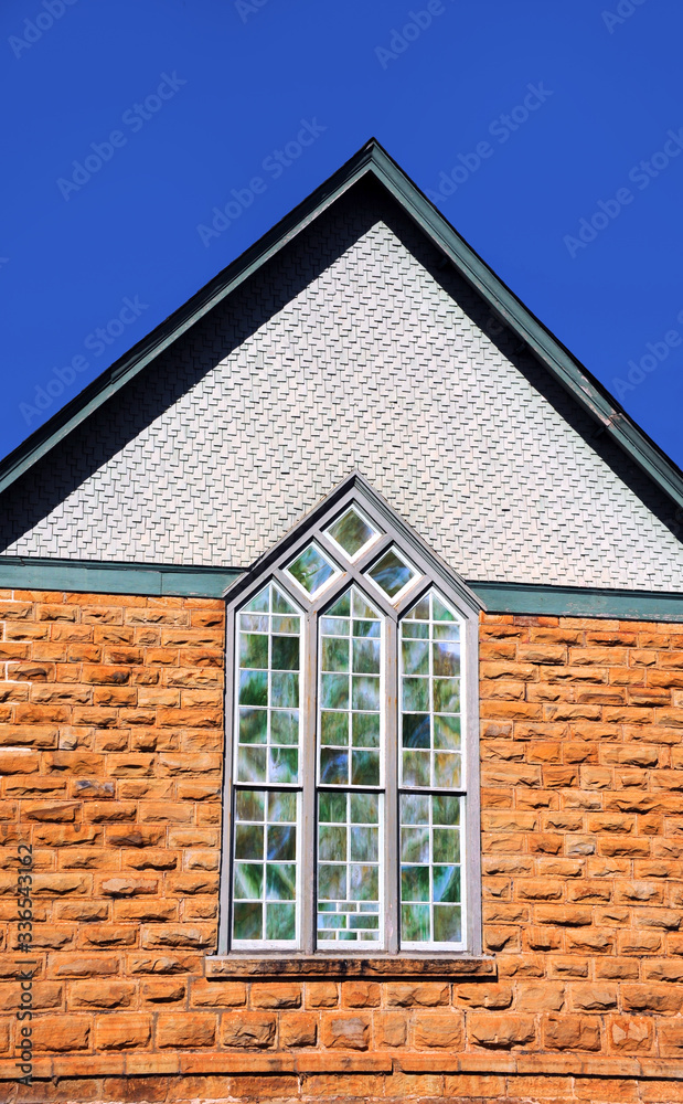 Historic church with stained glass window Historic church with stained glass window