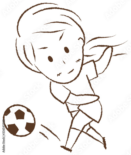 サッカーをする女の子　シュート