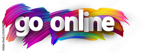 White go online sign over brush strokes background.