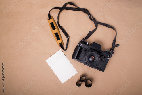 Retro camera with photo film and frame for photo card