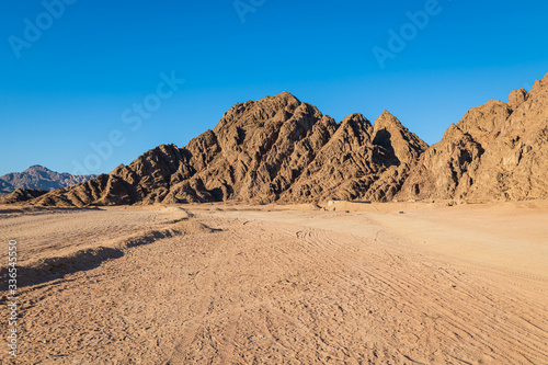 Arid mountains in the desert area of southern Sinai near to Sharm El-Sheikh during a safari tour (Egypt).