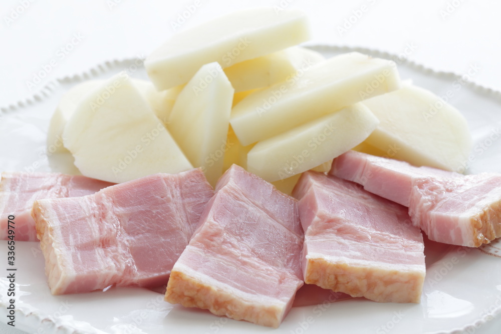 Chopped bacon and potato on dish for cooking ingredient