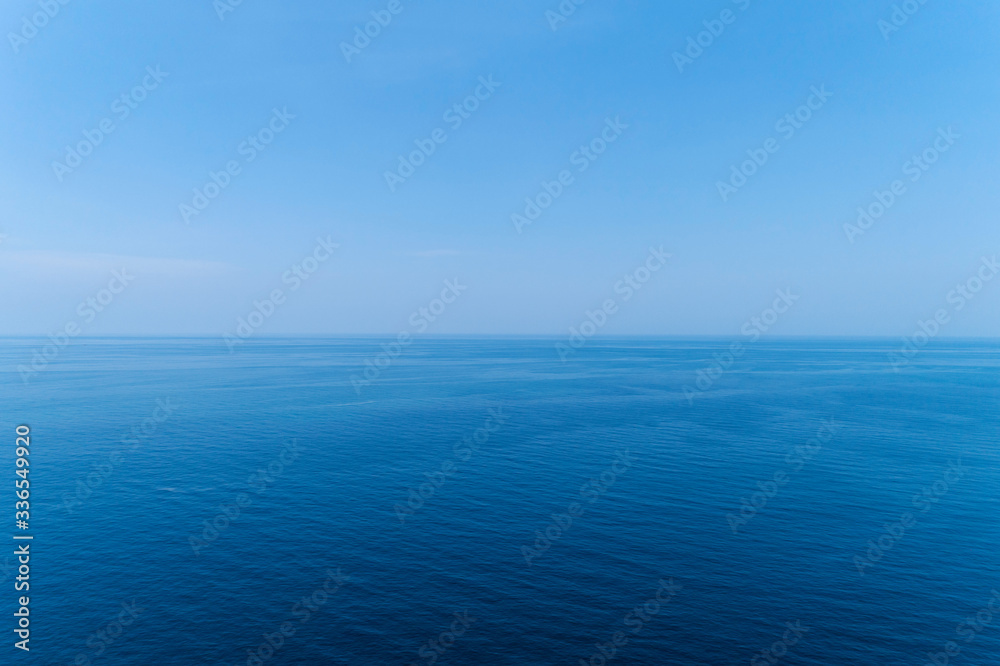 Blue ocean surface background Nature view from above shot by drone camera.