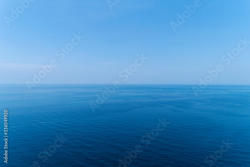 Blue ocean surface background Nature view from above shot by drone camera.