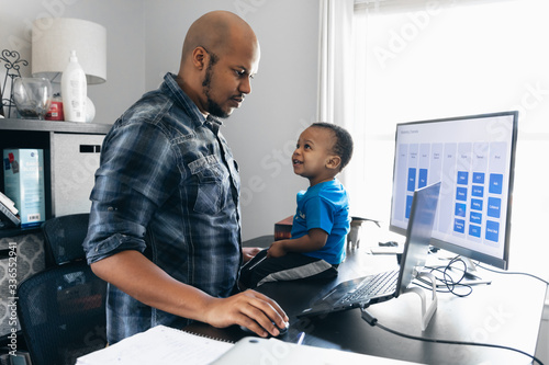 Father and son working from home during quarantine