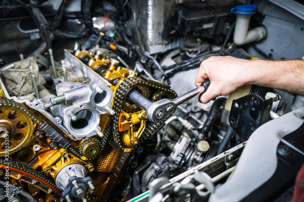 Fototapeta premium Car repair: overhaul of the V6 engine. Replacing drive chains.
