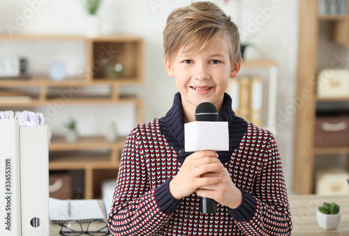 Little journalist with micr...