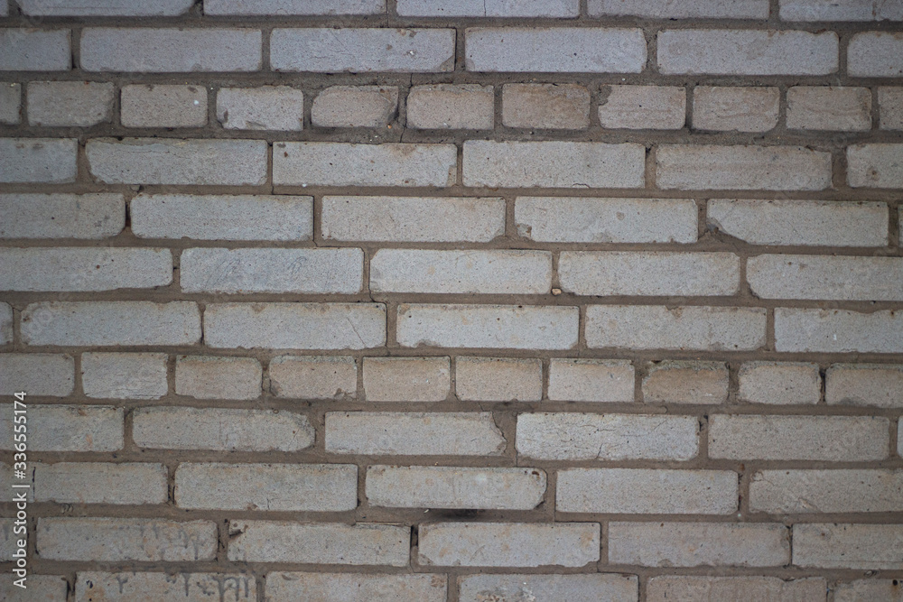 The brick wall. Simple background.