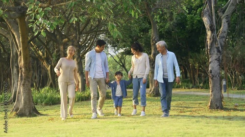 Wallpaper Mural happy multi generation asian family having a good time walking in park Torontodigital.ca